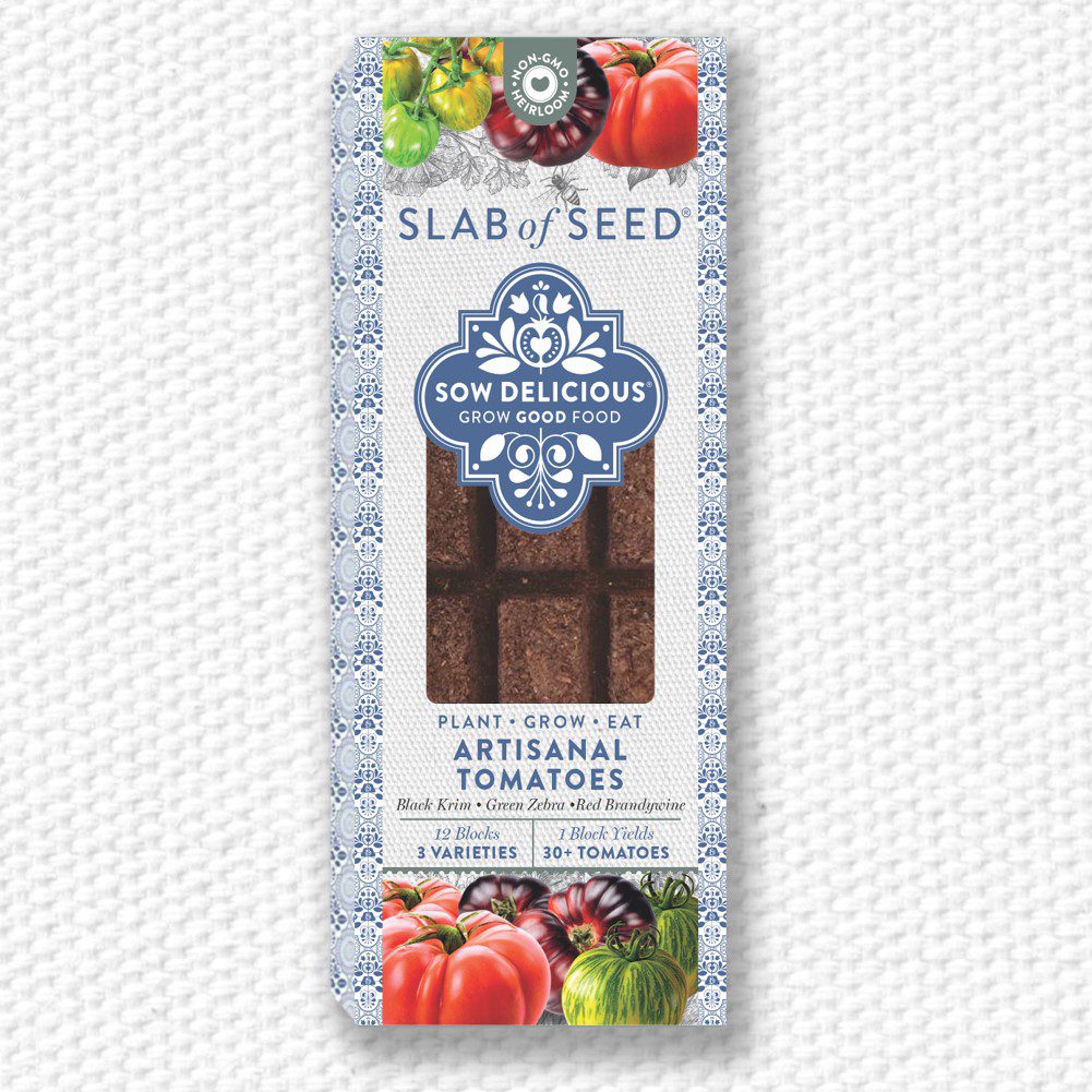 Packaged product for growing artisinal tomatoes with branding on a textured white background