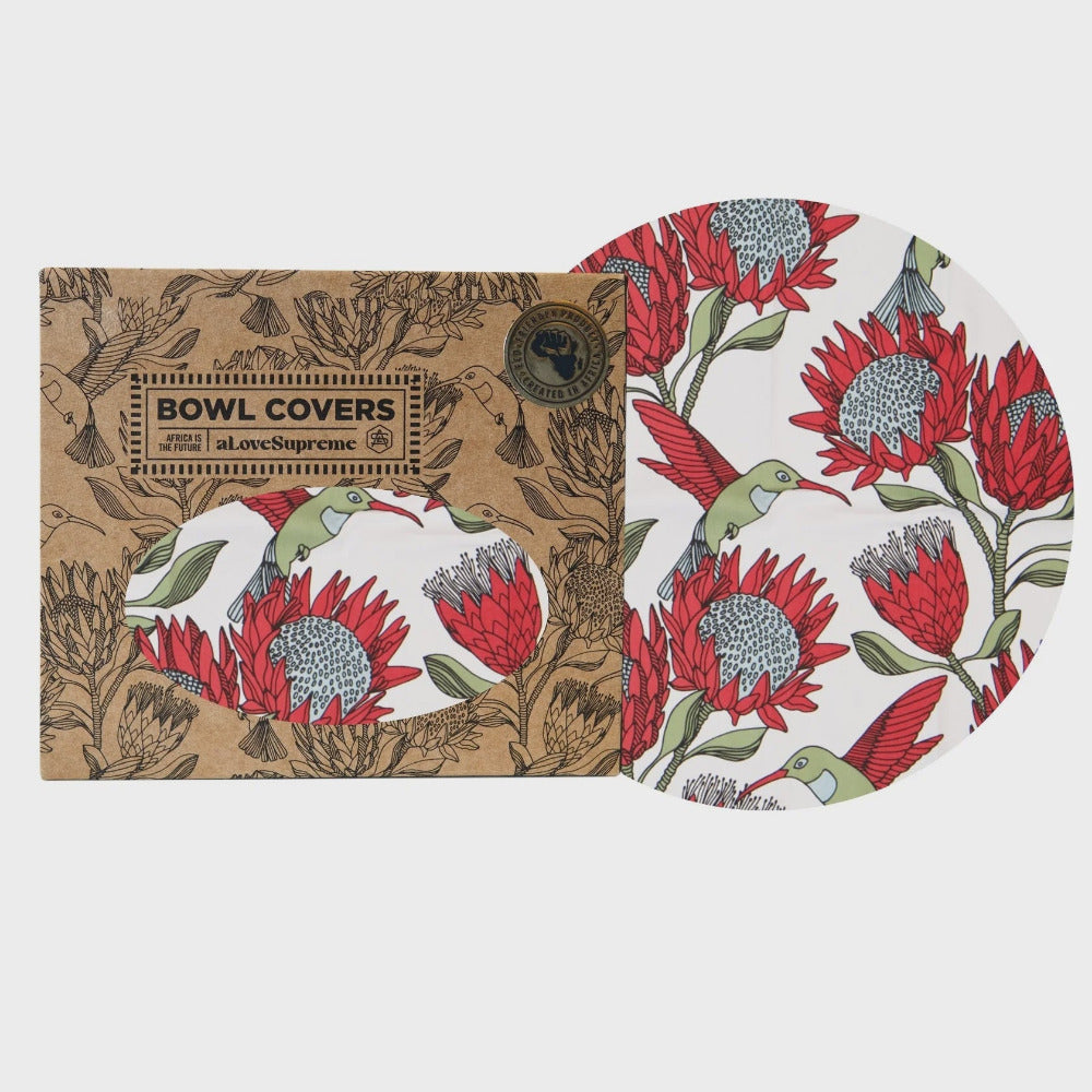 Bowl cover with floral and bird design on a white background