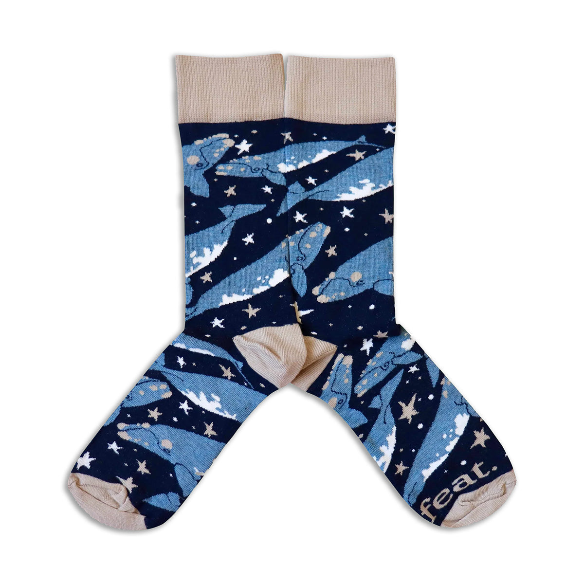 Sock with whale and star pattern on a white background