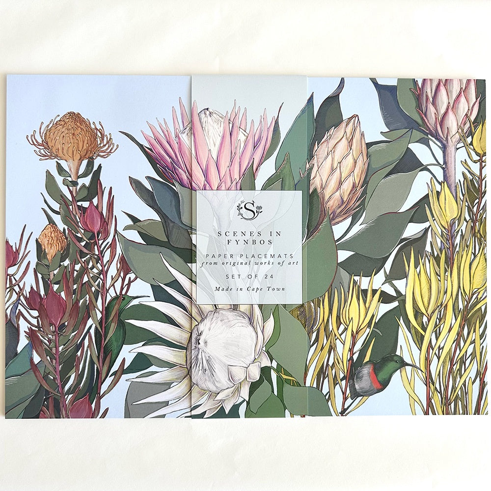 Set of paper placemats with fynbos design and brand label on a white background