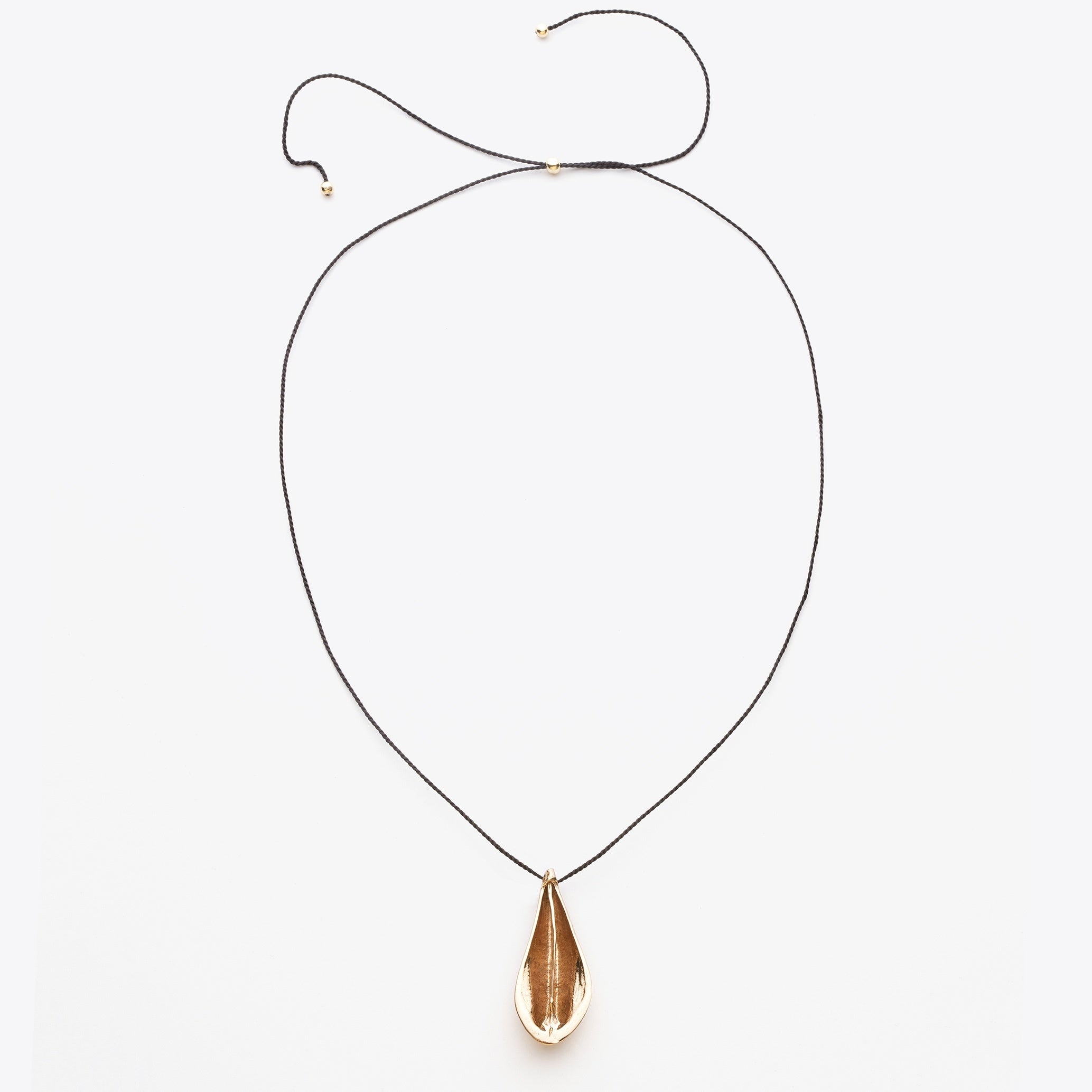 Necklace with a teardrop-shaped pendant on a white background