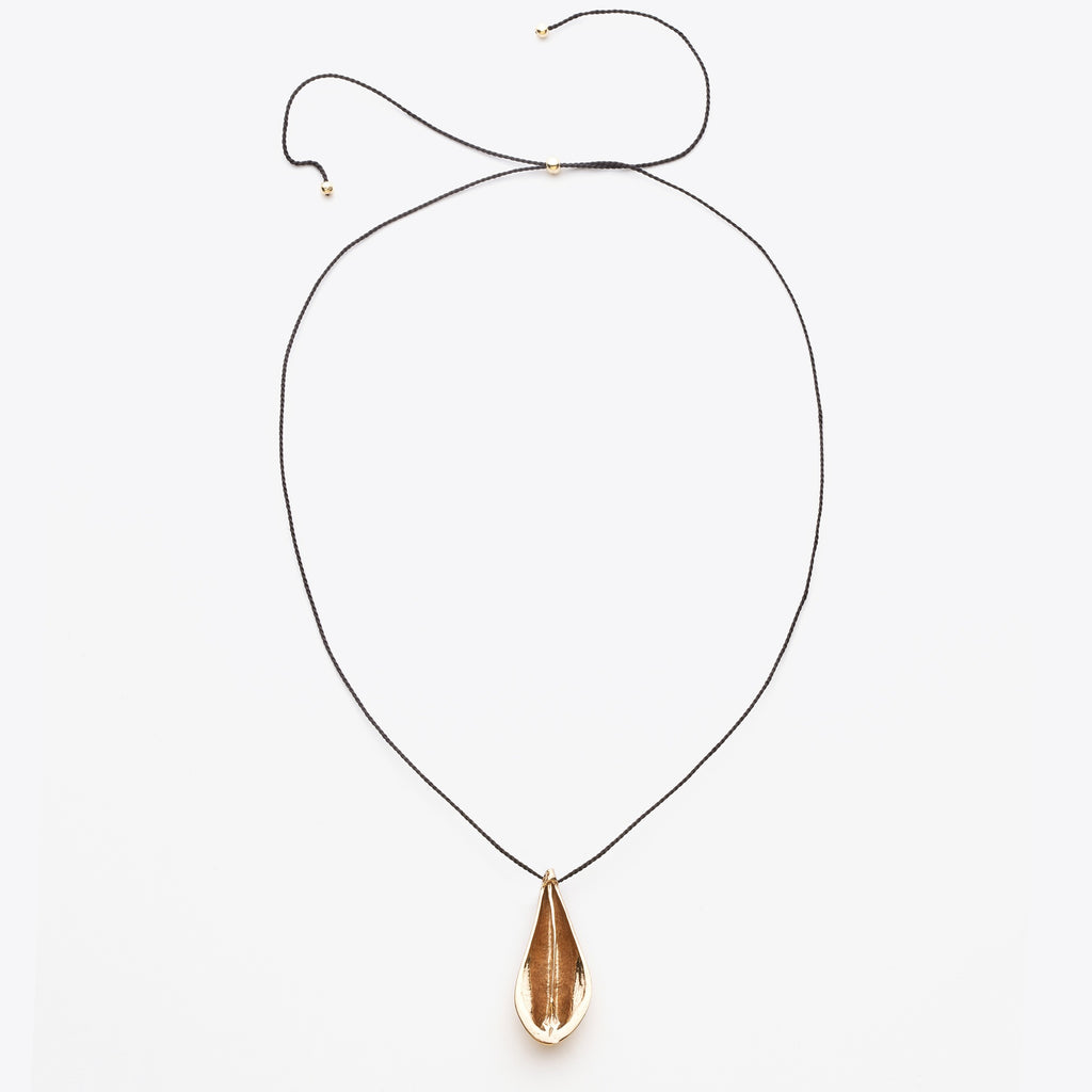 Necklace with a teardrop-shaped pendant on a white background