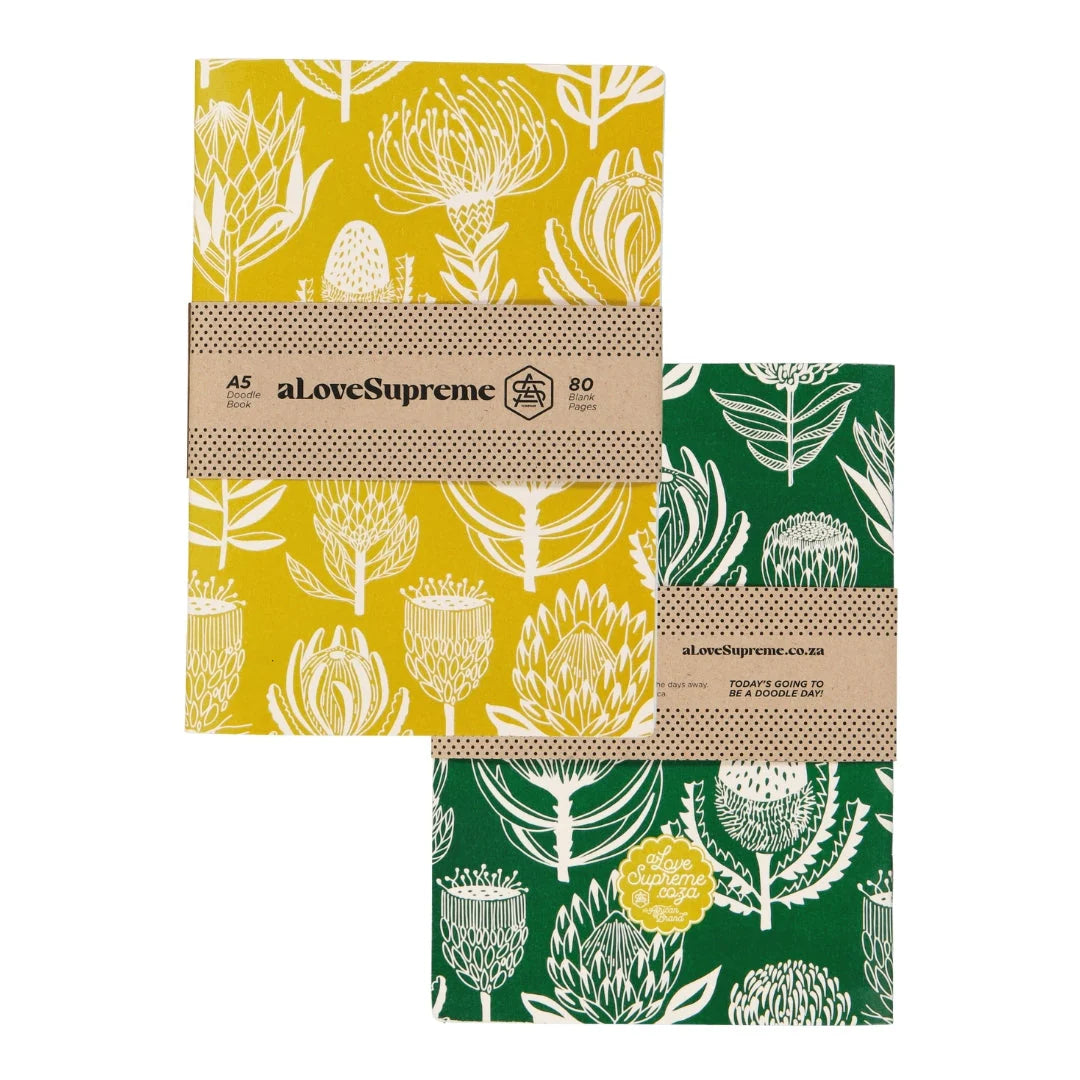 Two notebooks with floral patterns on a white background, featuring the brand 'aLoveSupreme'.