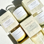 Load image into Gallery viewer, Amanda Jayne candles and boxes on a light background
