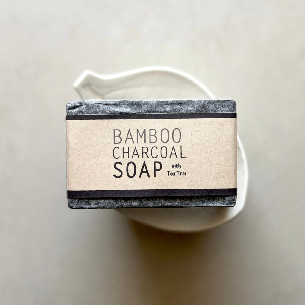 Bar of bamboo charcoal soap with a white background