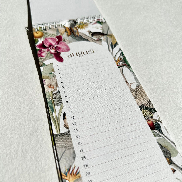 Floral-themed calendar with a floral design on a light gray background