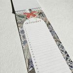 Load image into Gallery viewer, Pegboard with a calendar and decorative elements on a light gray background
