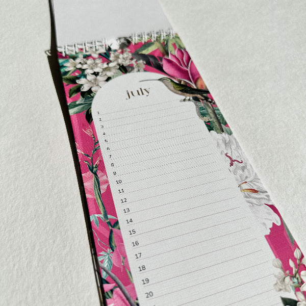 Floral-patterned monthly planner with July on a white background
