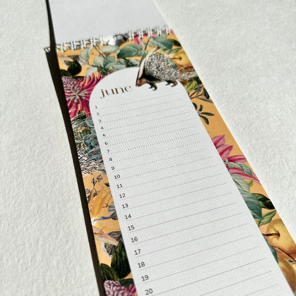 Floral-themed calendar with a porcupine design on a white background
