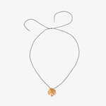 Load image into Gallery viewer, Bronze necklace with a floral pendant on a white background
