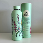 Load image into Gallery viewer, A turquoise CosyCore flask with various bird and botanical illustrations.
