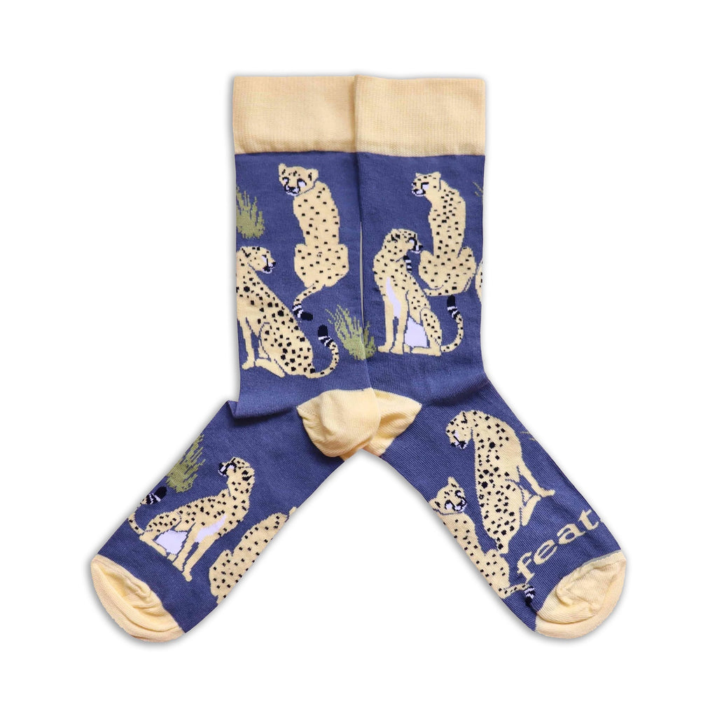 Blue socks with cheetah pattern on a white background