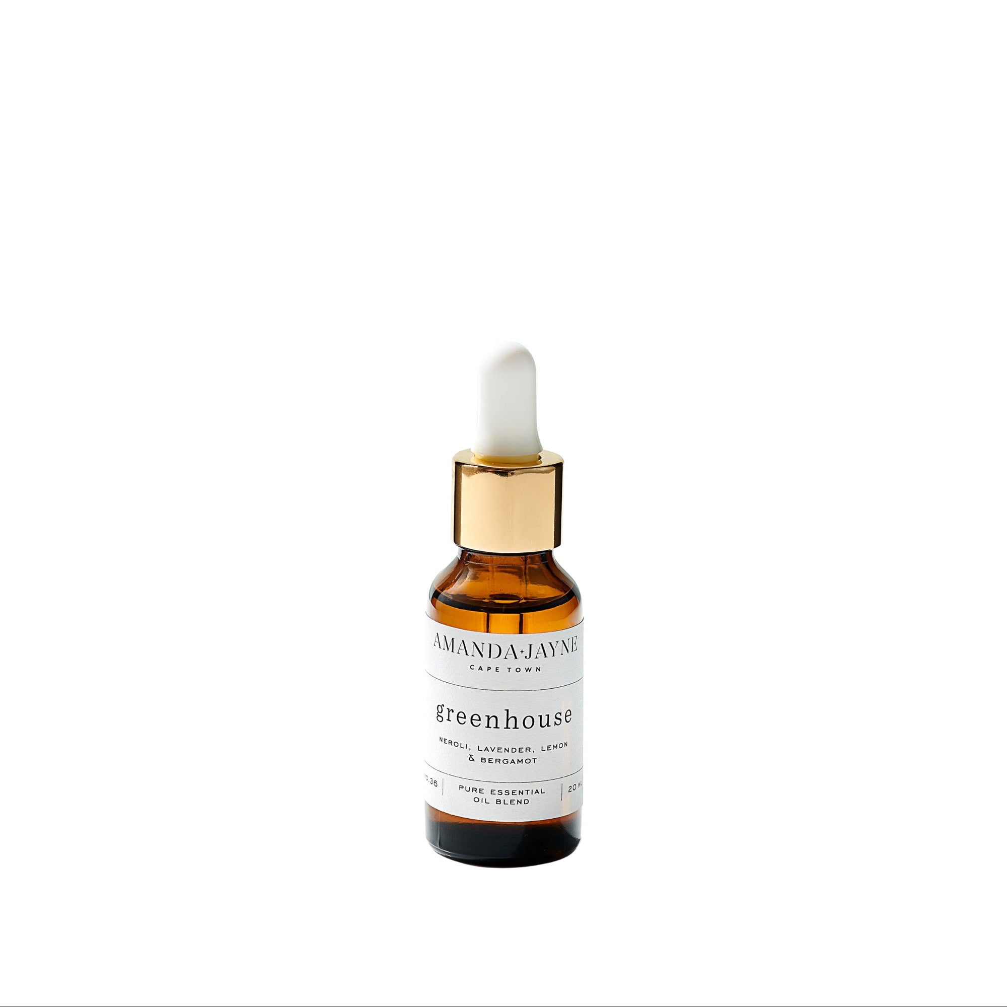 Amber glass dropper bottle with gold cap on a white background