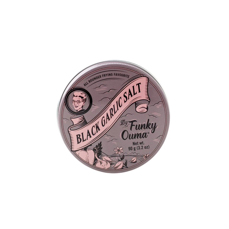 Container of black garlic salt by Funky Ouma on a white background