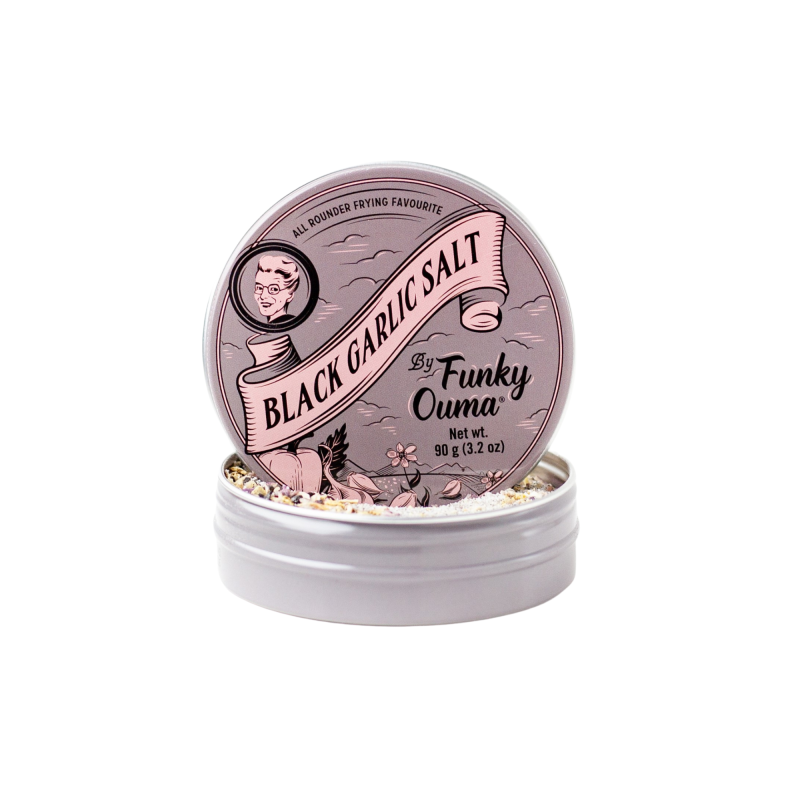 Container of black garlic salt by Funky Ouma on a white background