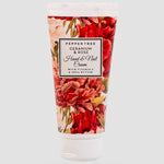 Load image into Gallery viewer, Hand and nail cream tube with floral design and visible brand name on a white background
