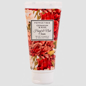 Hand and nail cream tube with floral design and visible brand name on a white background