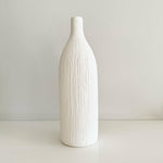 Load image into Gallery viewer, White textured vase on a light gray background
