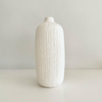 Load image into Gallery viewer, White textured vase on a light gray background
