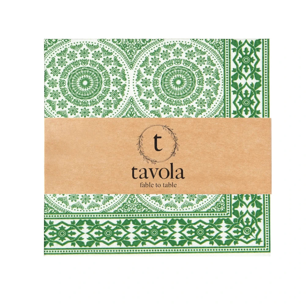 Packaging of Tavola napkins with green geometric patterns on a white background