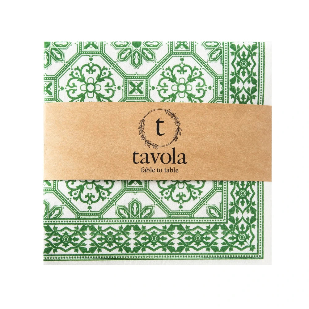 Green and white patterned napkin with a brown band featuring 'tavola' branding on a white background.