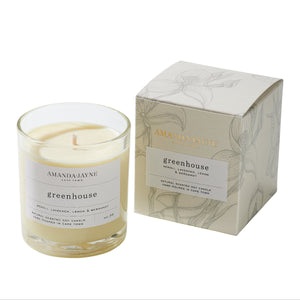 Amanda Jayne candle and its packaging on a white background