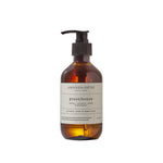 Load image into Gallery viewer, A bottle of Amanda Jayne Greenhouse hand and body wash on a white background
