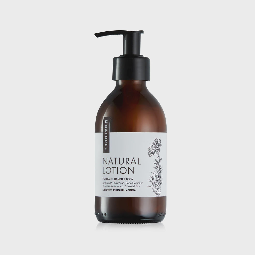 A amber glass bottle with a pump dispenser labeled 'Natural Lotion', containing ingredients such as Rosehip and Marula oils.