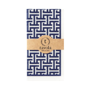 Pack of blue and white patterned napkins with a Tavola label on a white background