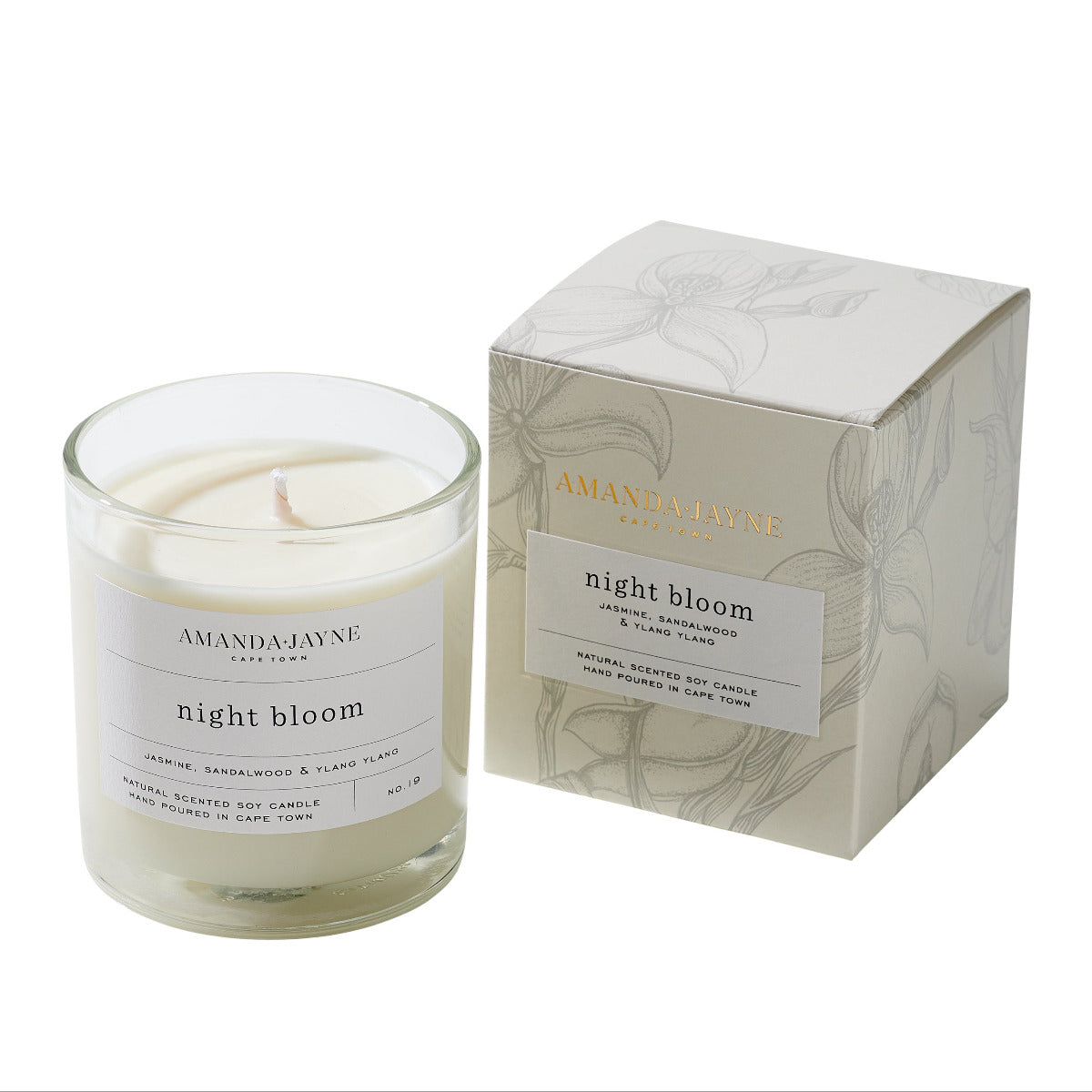 Amanda Jayne 'night bloom' candle with packaging on a white background