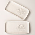 Load image into Gallery viewer, Two white ceramic slates, one with with a pincushion protea and the other with a king protea embossed on the right hand side. 
