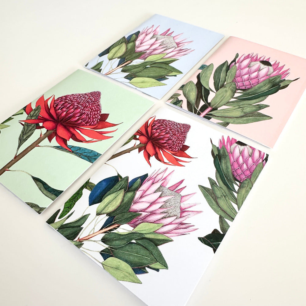 Set of four greeting cards with floral designs on a white background