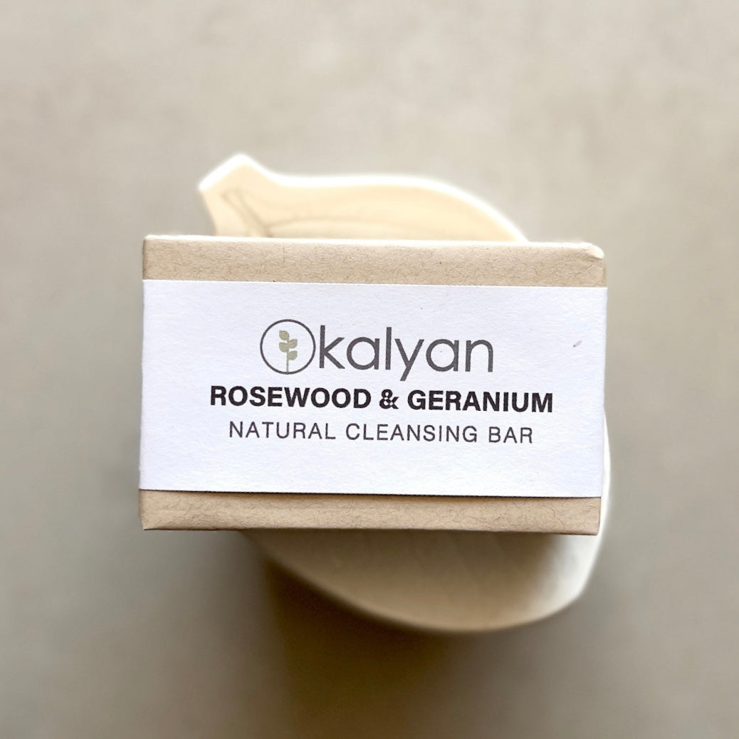 Kalyan Rosewood & Geranium natural cleansing bar on a neutral background