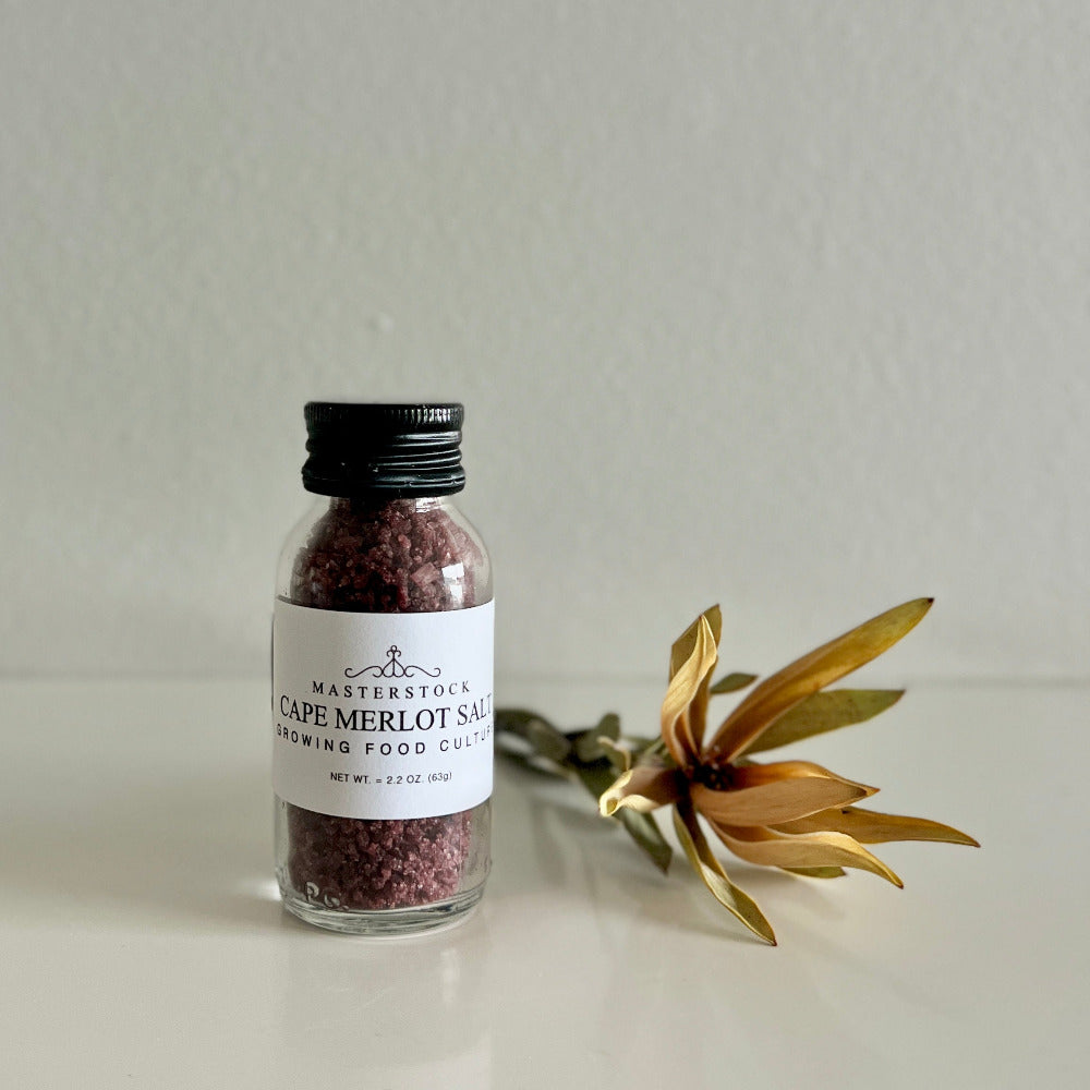 Bottle of Cape Merlot salt with a label on a light background