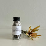 Load image into Gallery viewer, Bottle of Cape Seaweed Salt with a gold flower on a light gray background
