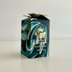 Load image into Gallery viewer, Handmade honey nougat box with marbled design and bee logo on a white background
