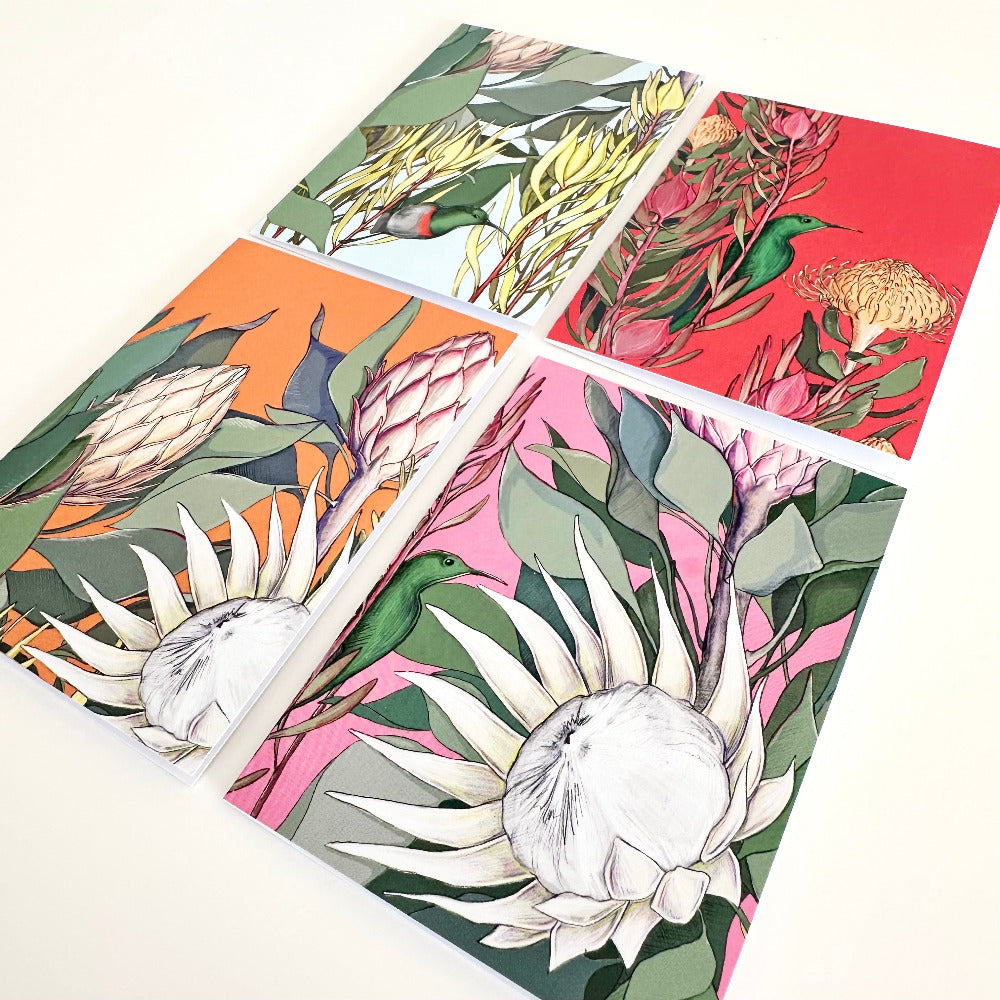 Four cards with floral designs on a white background