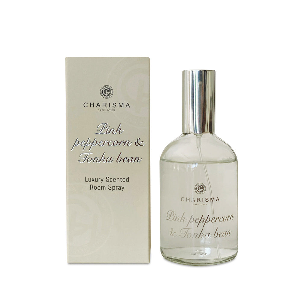 Charisma Pink peppercorn & Tonka bean room spray bottle and packaging on a white background
