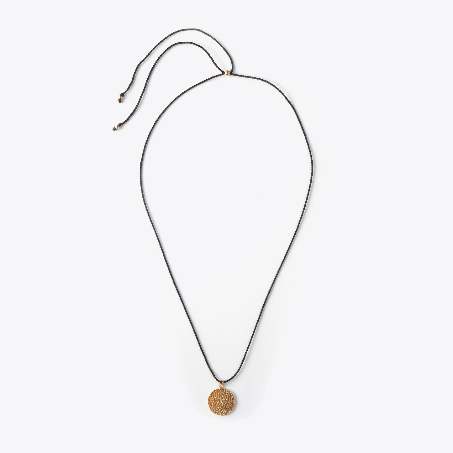 Necklace with a bronze pendant on a white background