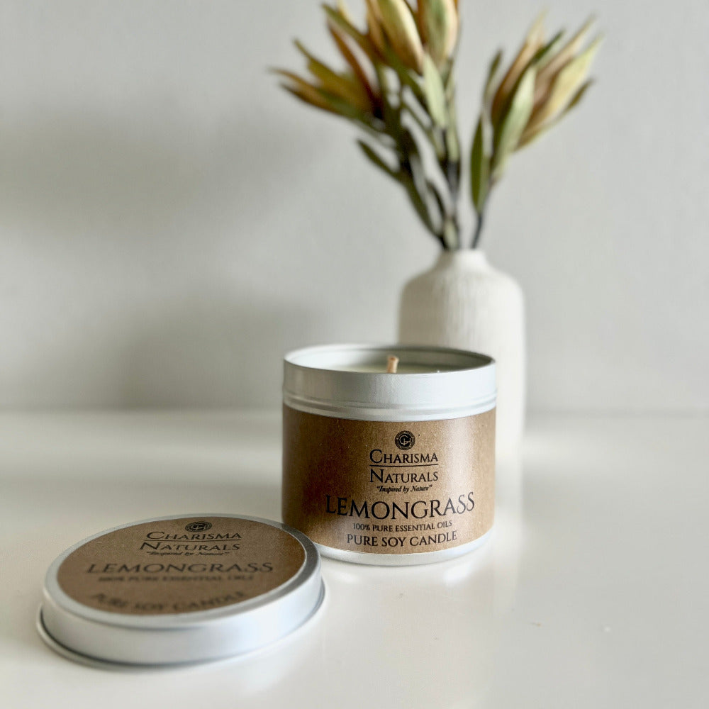 Charisma Naturals Lemongrass candle with packaging on a neutral background