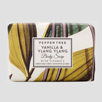 Load image into Gallery viewer, Bar of soap with leaf pattern and &#39;Peppertree Vanilla &amp; Ylang Ylang&#39; label on a white background
