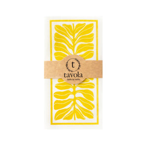 Tavola napkin with yellow leaf design on a white background