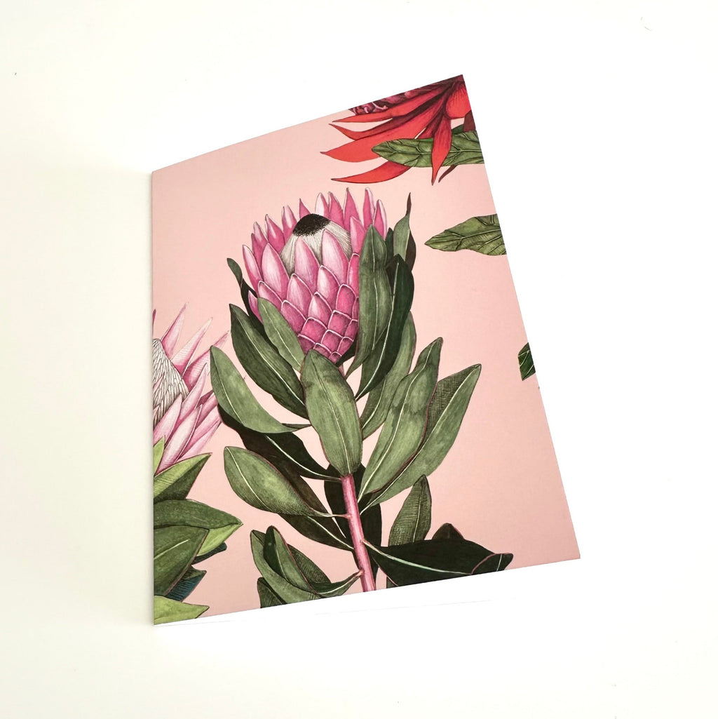 A6 greeting card with floral design on a pink background
