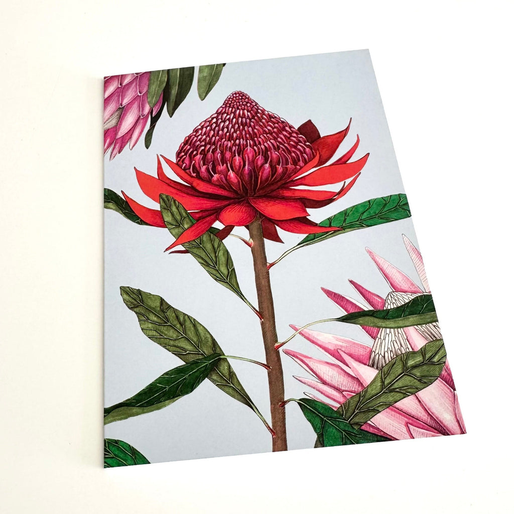 Floral design with red and pink flowers on a blue background