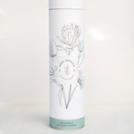 Load image into Gallery viewer, White tube packaging for Purely Porcelain&#39;s indigenous botanical diffuser set. 
