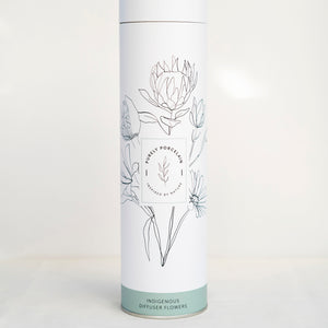 White tube packaging for Purely Porcelain's indigenous botanical diffuser set. 