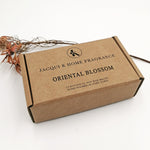 Load image into Gallery viewer, Brown box of Jacqui K Home Fragrance Oriental Blossom on a white background
